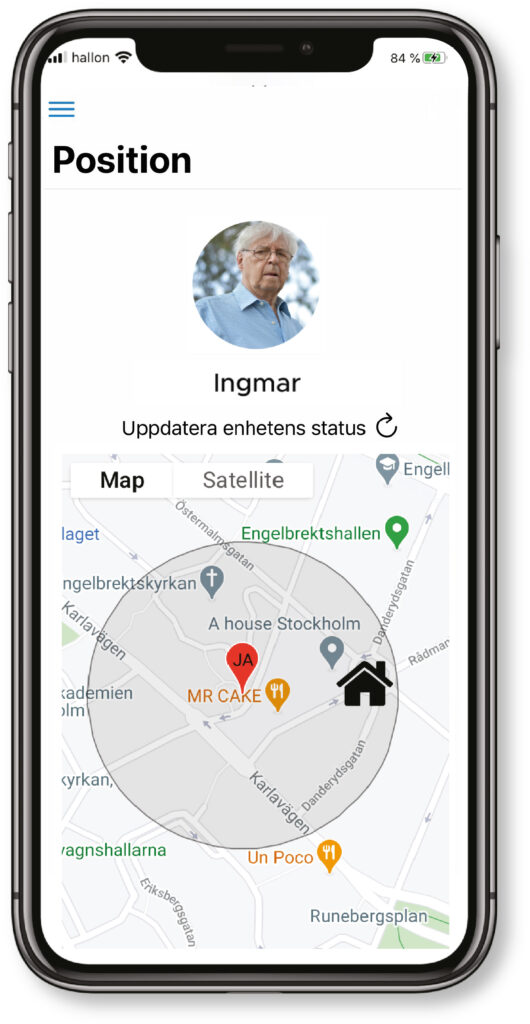 Telefon som visar en app med trygghetslarm och smarta funktioner. 